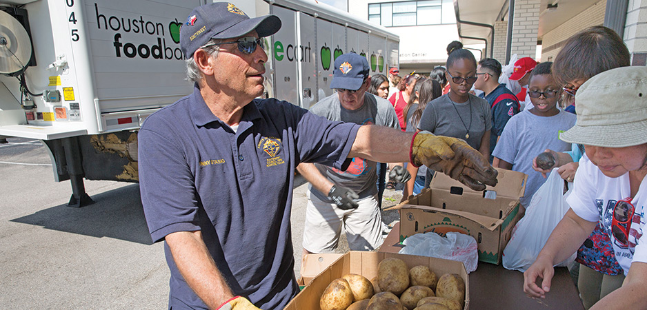 Knights distributing fresh produce and food to families in need