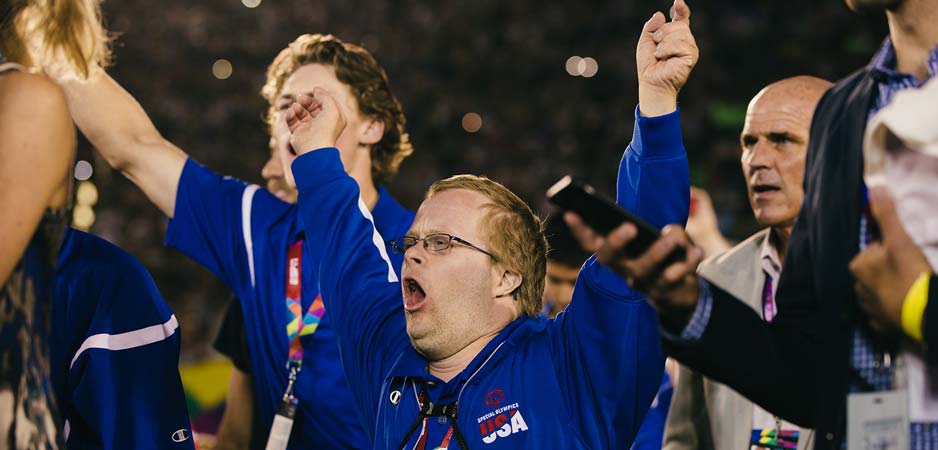 Athletes cheering in Special Olympics