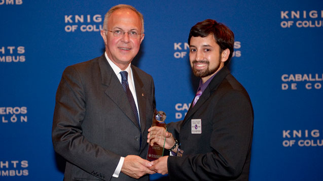 Grand Knight Kyle Mefferd of University of Nevada, Las Vegas Council 15061 receives the 2010-11 Highest Percentage Gain in Insurance Award from Supreme Knight Carl A. Anderson. Grand Knight Kyle Mefferd of University of Nevada, Las Vegas Council 15061 receives the 2010-11 Highest Percentage Gain in Insurance Award from Supreme Knight Carl A. Anderson.