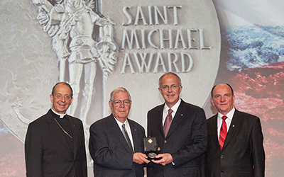 Joseph P. Schultz (second from left) and Poland State Deputy Krzysztof Orzechowski (right) are pictured with Archbishop Lori and Supreme Knight Anderson after Schultz was presented with the inaugural Saint Michael Award. Joseph P. Schultz (second from left) and Poland State Deputy Krzysztof Orzechowski (right) are pictured with Archbishop Lori and Supreme Knight Anderson after Schultz was presented with the inaugural Saint Michael Award.