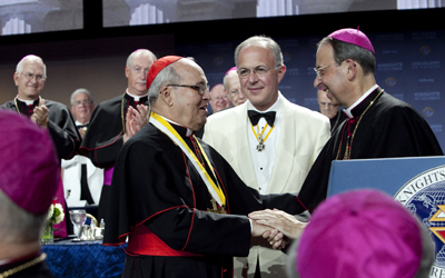 Supreme Chaplain Bishop William E. Lori and Supreme Knight Carl A. Anderson congratulate Cardinal Jaime Ortega y Alamino of Havana, Cuba, Gaudium et Spes Award honoree. Supreme Chaplain Bishop William E. Lori and Supreme Knight Carl A. Anderson congratulate Cardinal Jaime Ortega y Alamino of Havana, Cuba, Gaudium et Spes Award honoree.