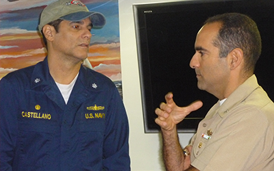 Capt. Castellano consults with actor Yul Vazquez, who portrays him in the movie. Capt. Castellano consults with actor Yul Vazquez, who portrays him in the movie.