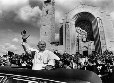 Pope John Paul II waves as he leaves the Basilica of the National Shrine of the Immaculate Conception in Washington D.C., on his 1979 trip to the United Pope John Paul II waves as he leaves the Basilica of the National Shrine of the Immaculate Conception in Washington D.C., on his 1979 trip to the United