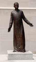 Statue of Father McGivney on grounds of McGivney Hall