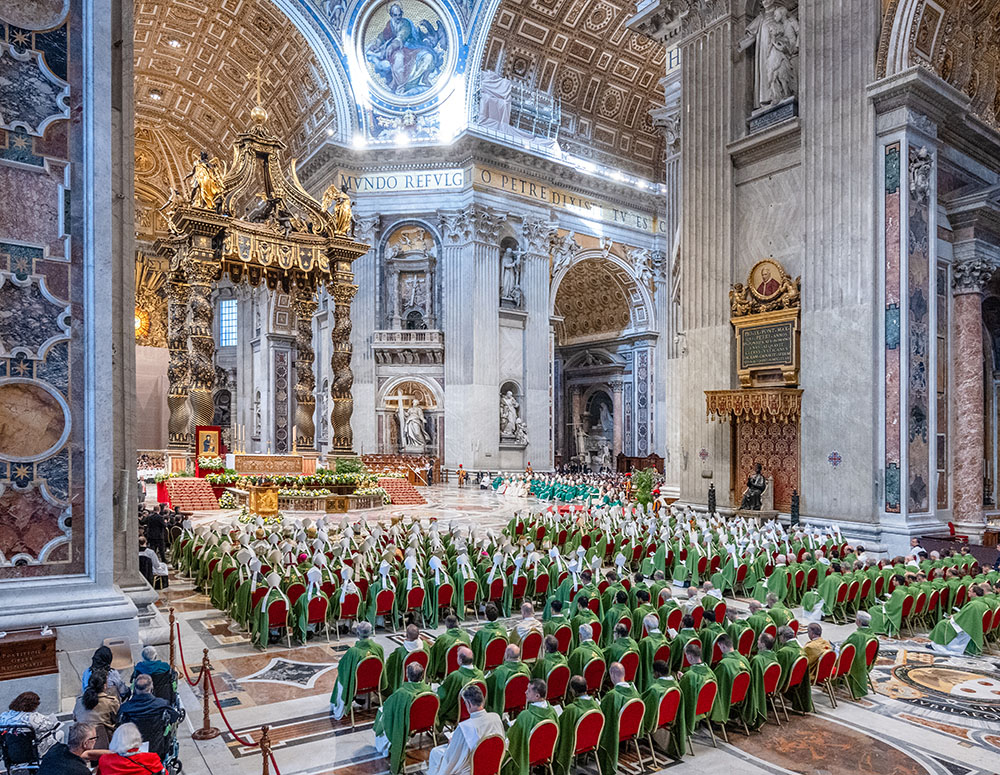Hundreds of bishops gather in St. Peter’s Basilica for the closing Mass of the Synod of Bishops on synodality at the Vatican on Oct. 27, days after scaffolding was removed from the Bernini baldacchino. (Photo by Tamino Petelinšek)