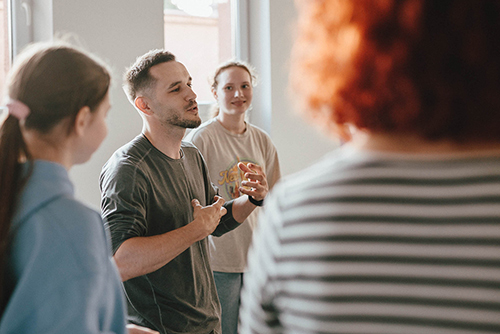 Mykola Panasiuk, an actor and director from Ukraine, leads a social theater workshop at the Blessed Michael McGivney House in Radom, Poland, this past June. (Photo by Sebastian Nycz)