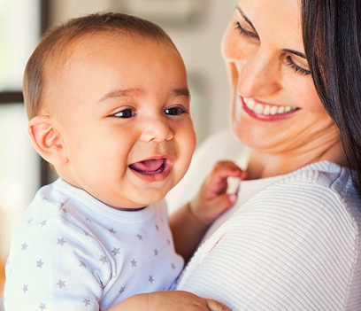 A mother holding her infant