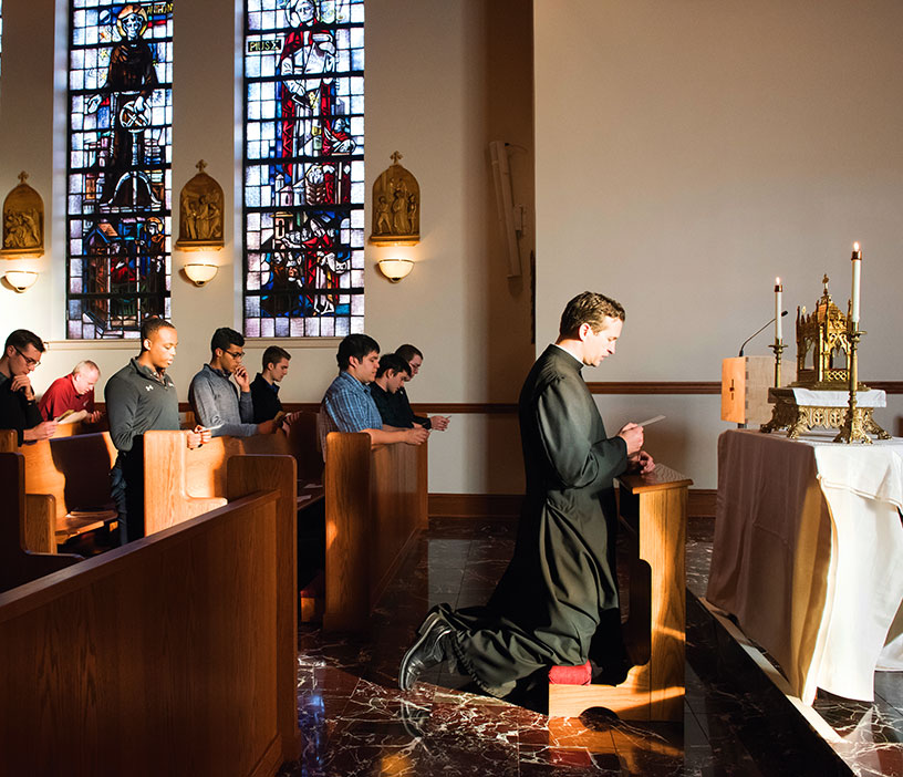 Knights and their families attend a mass service in support of the Catholic Church