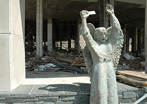 Destroyed Catholic sculpture