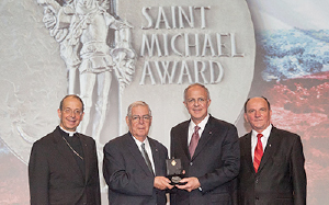 Supreme Knight Carl Anderson presents the Saint Michael Award to Former Supreme Master Joseph P. Schultz. Supreme Knight Carl Anderson presents the Saint Michael Award to Former Supreme Master Joseph P. Schultz.